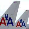 American Airlines planes sit at a gate at Washington's Ronald Reagan National Airport, Nov. 29, 2011. 
