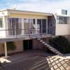 The backyard of the Elvis House, 2520 Castlesands Way, has fallen into disrepair. The home was last listed for sale in March 2011 for $225,000 by Tiffany and Tandi Huizenga, who had tried to sell the property three years earlier for $877,000. 