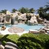 The Primms were inspired by pools they visited at Hawaiian resorts when they built the extensive pool area at their estate on Tomiyasu Lane. The pool has a water slide, fountains and, behind the waterfall, a grotto bar and a one-bedroom guest suite. Michael Jackson had plans to turn the cave area into a playhouse for his children.