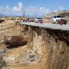 A section of the southbound lanes of Interstate 15 are shown in pieces near Moapa Tuesday, Sept. 9, 2014. About 1 mile of freeway was severely damaged by runoff from Monday's storm. The Nevada Department of Transportation expects to have two lanes open by the weekend, a spokesman said.