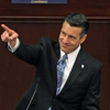Nevada Gov. Brian Sandoval presents his proposed business license fee plan to lawmakers at the Legislative Building in Carson City on Wednesday, March 18, 2015.