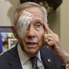 Senate Minority Leader Harry Reid of Nevada returns to Capitol Hill in Washington, D.C., on Tuesday, Jan. 20, 2015, for the first time since suffering injuries after an exercise accident. 