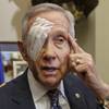 Senate Minority Leader Harry Reid, 75, talks to reporters on Capitol Hill in Washington, Thursday, Jan. 22, 2015, for the first time since he suffered an eye injury and broken ribs on New Year's Day accident while exercising at his home in Henderson.