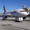 In this Thursday, May 9, 2013, file photo, two Allegiant Air jets taxi at McCarran International Airport in Las Vegas.