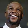 Floyd Mayweather Jr. sits in his corner Sept. 12 during his welterweight title bout against Andre Berto in Las Vegas, which he billed as his last-ever fight.