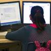 Math teacher Kelli Greenwald reviews some problems with middle school students attending the CCSD online school Nevada Learning Academy on Tuesday, September 15, 2015.