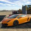 Erik Pappa, Clark County director of public communications, takes a photo of a Lamborghini Gallardo LP550 during a ground breaking ceremony for Speed Vegas, a $30 million, 90-acre racetrack project on Las Vegas Boulevard south of the M Resort, Monday, Sept. 21, 2015. The project is expected to open in early 2016.