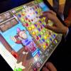 Attendees check out the latest in slot machines and other gaming technology during the Global Gaming Expo (G2E) at the Sands Expo Center Wednesday, Oct. 16, 2019.
