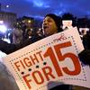 Demonstrators rally for better wages outside a McDonalds in Chicago, Thursday, Dec., 5, 2013.