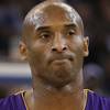 In this July 26, 2018 file photo former Los Angeles Laker Kobe Bryant and his daughter Gianna watch during the U.S. national championships swimming meet in Irvine, Calif. Bryant, the 18-time NBA All-Star who won five championships and became one of the greatest basketball players of his generation during a 20-year career with the Los Angeles Lakers, died in a helicopter crash Sunday, Jan. 26, 2020. Gianna also died in the crash. She was 13.

