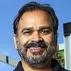 Owner Rajesh Patel poses in front of the City Center Motel, where an Indian restaurant is under construction at Fremont and Seventh streets, Wednesday, Dec. 23, 2015. The 6,000-square-foot restaurant, including an outdoor second-floor dining area, is expected to open in the summer of 2016, he said.