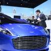 In-car display of the LeTV ecosystem and connected car technologies in an Aston Martin RapidE S at the Consumer Electronics Show on Wednesday, Jan. 6, 2016, in Las Vegas. LeTV's SEE Plan seeks to build an open automotive ecosystem for energy-efficient, intelligent and connected vehicles. 