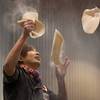 Joe Montuori of PizzaLinos in Bayonne, N.J., competes in the World Pizza Games Freestyle Acrobatic Dough Tossing event at the International Pizza Expo on Tuesday, March 8, 2016, in the Las Vegas Convention Center.