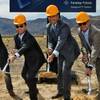 Tom Wessner of Faraday Future, Ding Lei of China’s LeEco, Gov. Brian Sandoval and Dag Reckhorn of Faraday Future throw the first shovels of dirt Wednesday, April 13, 2016, during the Faraday Future groundbreaking.