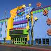 The IncrediBear poses at the Twister ride in John's Incredible Pizza at the Boulevard mall Jan. 27, 2016. The pizza chain caters to families with arcade games, bowling, bumper cars and laser tag.