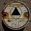 A monitoring well is shown Wednesday, June 15, 2016, near Maryland Square Shopping Center, where nearly two decades ago environmental regulators discovered a cancer-causing chemical near Boulevard Mall.