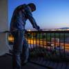 Michael Hutchings, a building developer who has been struggling since the recession to make the payments on the home he built in 2006, on his balcony in Las Vegas, June 4, 2016. Years after bad loans and plunging home values made Las Vegas the center of the crisis, thousands of people across the valley have yet to recover from the cataclysm. 