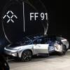 The silver-bodied FF 91 speedy electric car has a sleek black hood, fluorescent head and tail lights, and a 130-killowatts-per-hour battery which allows for travel up to 378 miles on a full charge. It was revealed during CES in Las Vegas on Jan. 3, 2017.