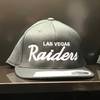 Unlicensed Las Vegas Raiders hats are on sale for $30 at Suite 160 at the Shoppes at Mandalay Place. 