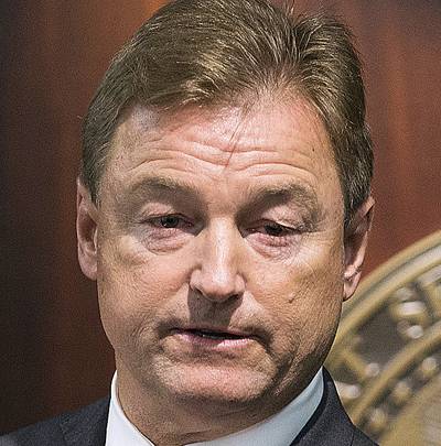 Sen. Dean Heller answers a question during a town hall at the Reno Sparks Convention Center in Reno, April 17, 2107. Heller co-hosted the two-hour event with Rep. Mark Amodei, another Nevada Republican. Sen. Dean Heller answers a question during a town hall at the Reno Sparks Convention Center in Reno, April 17, 2107. Heller co-hosted the two-hour event with Rep. Mark Amodei, another Nevada Republican.