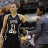 In this July 12, 2017, file photo, San Antonio Stars' Kayla McBride laughs with head coach Vickie Johnson during the second half of a WNBA basketball game against the Indiana Fever in Indianapolis.