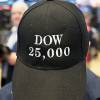Stock trader Peter Tuchman wears a Dow 25,000 hat, Thursday, Jan. 4, 2018, at the New York Stock Exchange. The Dow Jones industrial average closed above 25,000 points for the first time, just five weeks after its first close above 24,000. 