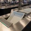 Travelers use new automated screening lanes at the security checkpoint in Terminal 3 at McCarran International Airport in Las Vegas, Nev. on August 31, 2017.