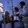 In this Aug. 1, 2017, photo, Eddie Powers, right, performs as Elvis during a wedding for Wil and Sarah Wilson in Las Vegas. Powers works full-time as an Elvis tribute artist performing at weddings and leading Elvis themed tours around Las Vegas. 