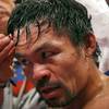 WBA welterweight champion Manny Pacquiao connects with a punch on Adrien Broner during their title fight at the MGM Grand Garden Arena Saturday, Jan. 19, 2019. Pacquiao retained his title with a unanimous-decision win.
