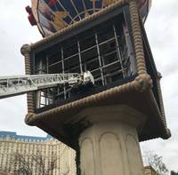 Firefighters rescued a worker who fell today inside the balloon-shaped sign atop the marquee at the Paris Las Vegas, according to the Clark County Fire Department. The worker ...