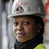 Carina Sowinski, a senior safety engineer for Mortenson Co., one of two lead contractors that built Allegiant Stadium, poses for a photo inside the nearly finished stadium, circa July 2020.