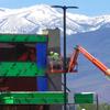 A construction worker works on the exterior of the Legends Bay Casino, Friday, May 13, 2022, in Sparks, Nev. The new casino is scheduled to open this summer at The Outlets at Legends shopping center along I-80 next to the Sparks Marina.
