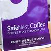 SafeNest clients Charmaine, left, and Tyresha package SafeNest Coffee for shipment at the SafeNest offices Thursday, July 21, 2022.