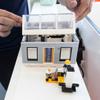 Paolo Tiramani shows off a Lego model of a Boxabl Casita at the Boxabl factory in North Las Vegas Wednesday, Aug. 10, 2022.