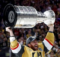 With pyrotechnics sparkling in the background, Mark Stone took the Stanley Cup handoff from NHL commissioner Gary Bettman, hoisted the nearly 37-pound trophy over ...

