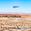 A helicopter transports some drill fly skids and a supply agritainer between the former Las Vegas Bay Marina and the site of a new weir the Southern Nevada Water Authority plans to build Wednesday, January 8, 2024. The platforms will be used to conduct geotechnical surveys of the banks' soil.