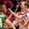 UNLV Lady Rebels guard Amarachi Kimpson, left, is congratulated by teammate Ashley Scoggin after making a basket and drawing a foul in the second half of an NCAA women’s semifinal game against the Colorado State Rams during the Mountain West Championships at the Thomas & Mack Center Tuesday, March 12, 2024.
