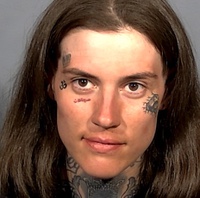 A description of a woman with face tattoos led to the arrest of a suspect in the fatal shooting of a man sitting in a van, according to Metro Police. Kayla Alery, 27, was booked at ...