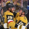 Vegas Golden Knights left wing William Carrier (28) congratulates center Brett Howden (21) after Howden scored a goal during the second period of an NHL hockey game at T-Mobile Arena Tuesday, March 19, 2024.