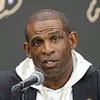Colorado head football coach Deion Sanders responds to a question during Big 12 Media Day at Allegiant Stadium Wednesday, July 10, 2024.