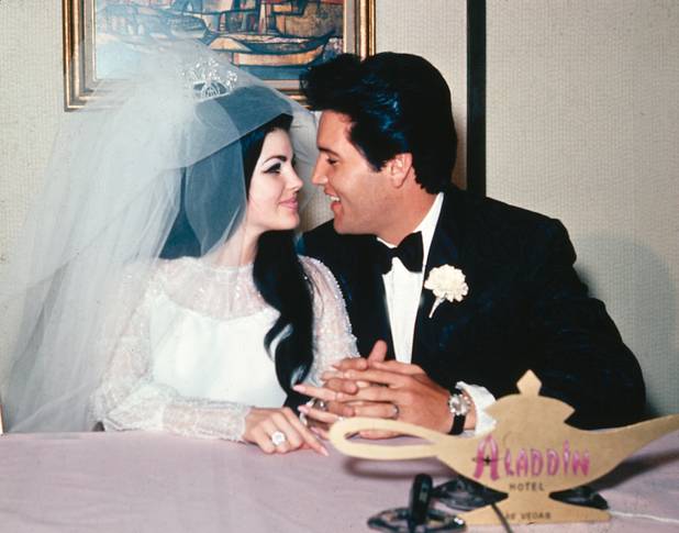 Singer Elvis Presley and his bride, the former Priscilla Beaulieu, ...