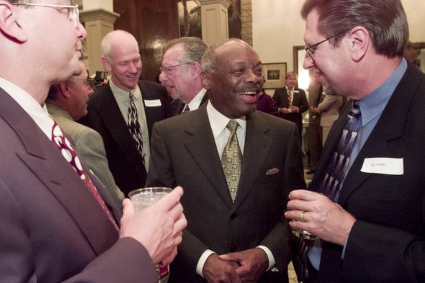 San Francisco Mayor Willie Brown talks with advertising executive Tom Litizia during a fundraising event for Brown at Las Vegas Mayor Oscar Goodman's home November 3rd, 1999.
