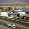 A lone truck drives along I-15 past the shuttered Oasis casino in Mesquite.