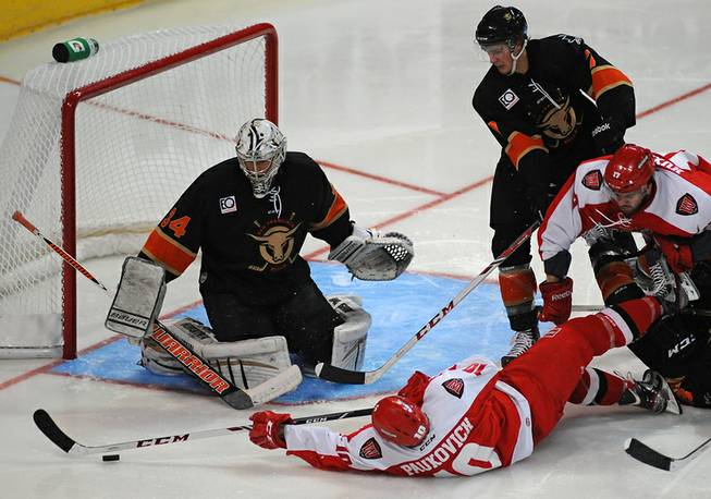 Las Vegas Wranglers forward Geoff Paukovich (10) attempts to get his stick on a rebound after San Francisco Bulls goaltender Tyler Beskorowany stopped an initial shot from Paukovich during the third period of play on Sunday afternoon at the Orleans Arena.