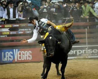 Brazil's Robson Palermo wins the third round of the 2009 Professional Bull Riders World Finals at Thomas & Mack Center on Nov. 1, 2009, atop Black Pearl.