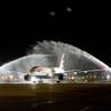 A British Airways' B777 passenger jet is welcomed with a traditional water cannon salute during the arrival of an inaugural flight for British Airways at McCarran International Airport in Las Vegas, Sunday, Oct. 25, 2009. The daily non-stop service is between London's Heathrow Airport and Las Vegas. 