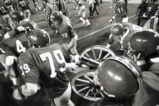 Football team with Fremont Cannon circa 1974. (UNLV Photo Services)
