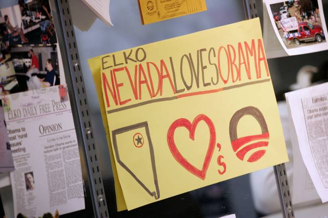 Signs and clippings on the wall of Barack Obama's headquarters in Elko Thursday, Jan. 17, 2008.