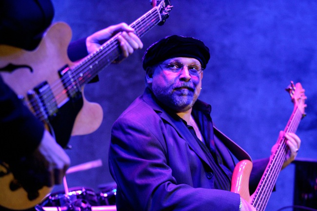 Tim Scott  plays bass with The Other Guys.