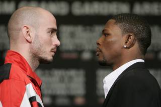 WBC middleweight champion Kelly Pavlik, left, of Ohio, and Jermain Taylor, of Arkansas, pose face-to-face during a news conference at the MGM Grand Wednesday February 13, 2008. Pavlik will face Taylor in a 12-round non-title rematch in the MGM Grand Garden Arena Saturday.